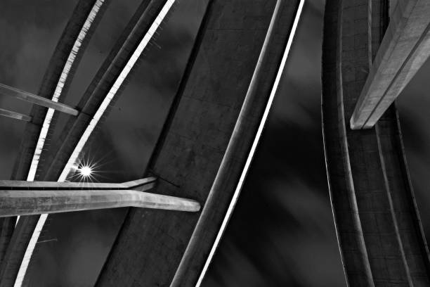 istock Curve bridges and foundation pillars at night (black and white) 1062174498