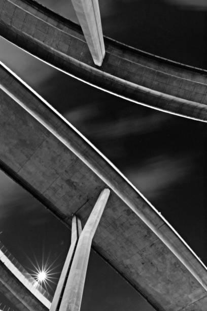 istock Curve bridges and foundation pillars at night (black and white) 1062175018