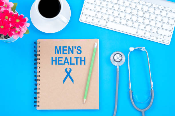 istock Top viwe of modern workplace with stethoscope and keyboard on blue table background. Flat lay design and copy space. Medical concept. 1062183018