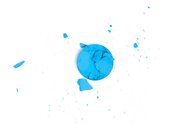 istock top view of blue cracked eyeshadow on white background 1062192530
