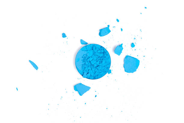 istock top view of blue cracked eyeshadow on white background 1062192550