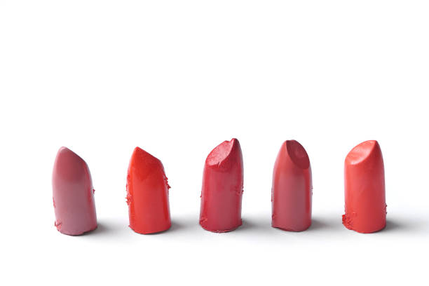 istock close up view of cut lipsticks on different colors on white backdrop 1062192754
