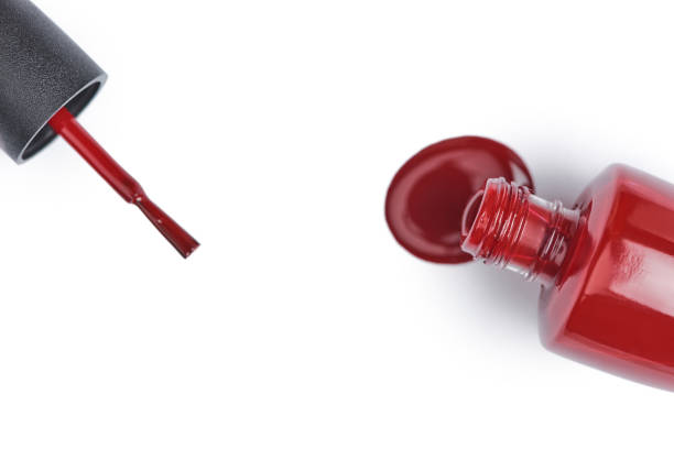 istock top view of red nail polish on white background 1062192836