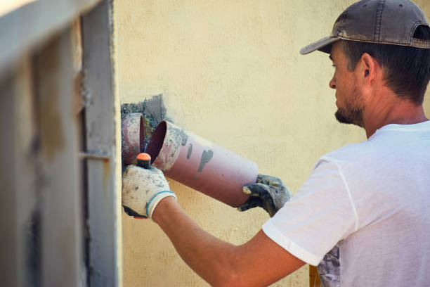 istock Builder at the finish house working with the tool. 1062198542