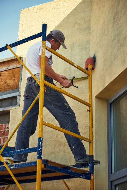 istock Builder at the finish house working with the tool. 1062198552