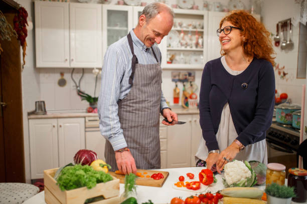istock Mature couple cooking together 1062201128