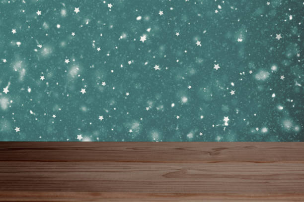 istock blank table on the winter snowy christmas background 1062204056