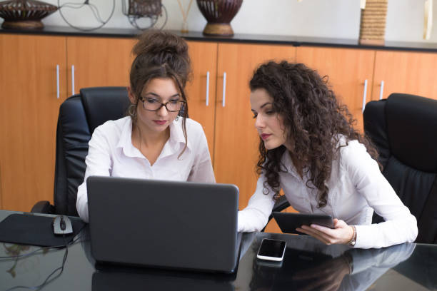 istock Young businesswomen working in the office 1062208230