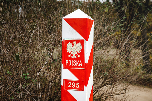 Polish border pillar. The official marked border of Poland and Germany, inside of European Union.