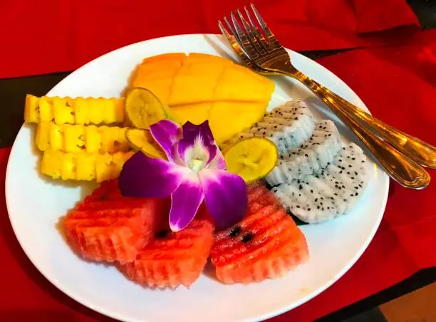 Living a healthy life embracing the Asian Culture having a delicious Tropical Fruit Plate already for Breakfast