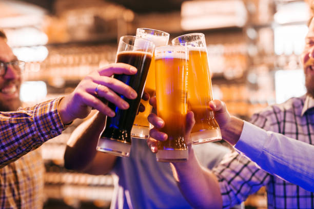 istock Friends making a toast with beer. 1062235594