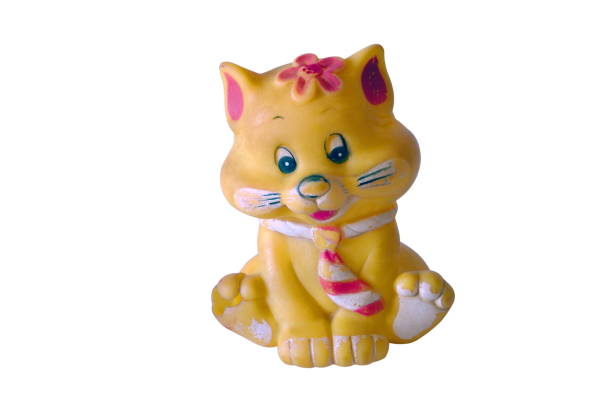 istock Image of old rubber toy yellow kitten on white background. 1062236566