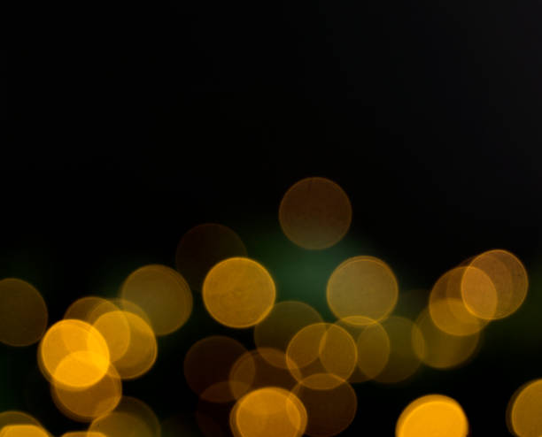 istock Yellow bokeh holiday. Abstract Christmas holiday background 1062240428