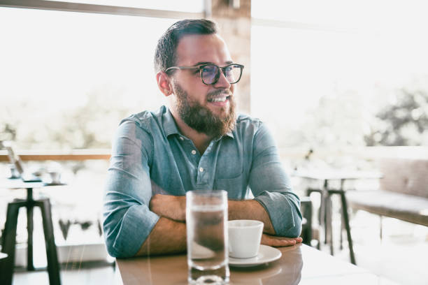 Smiling Hipster Student On A Coffee Break