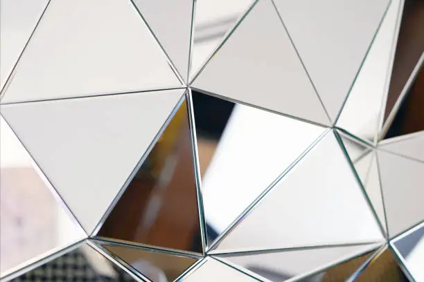 Photo of Abstract mirror. Close-up.
