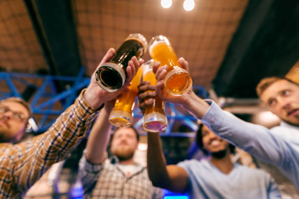 istock Friends making a toast with beer. 1062246998