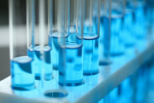 istock Test tube of glass overflows liquid solution potassium 1062247206