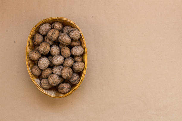istock Top view of walnuts in wicker  basket 1062247456