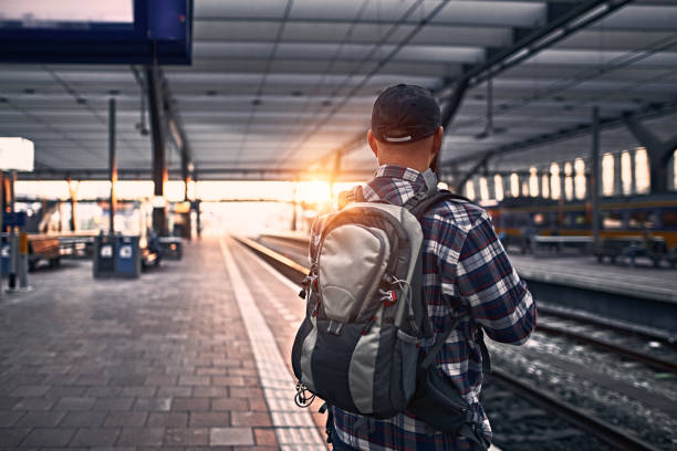 istock Waiting for the train at Railway station 1062249442