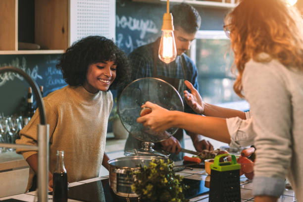 Friends Living And Cooking Together