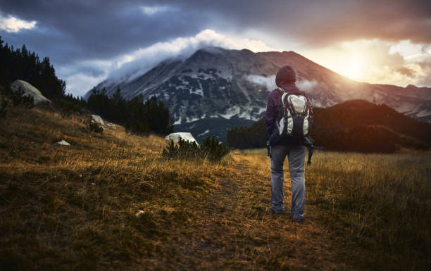istock Traveling alone in the mountains at sunset 1062249994