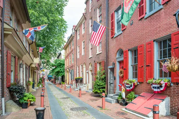 Stock photograph of historic Elfreth's Alley in the Old City district of Philadelphia Pennsylvania USA.