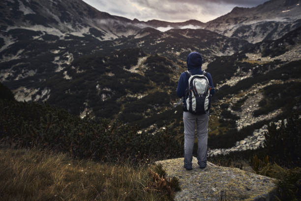 istock Traveling alone in the mountains at sunset 1062250168
