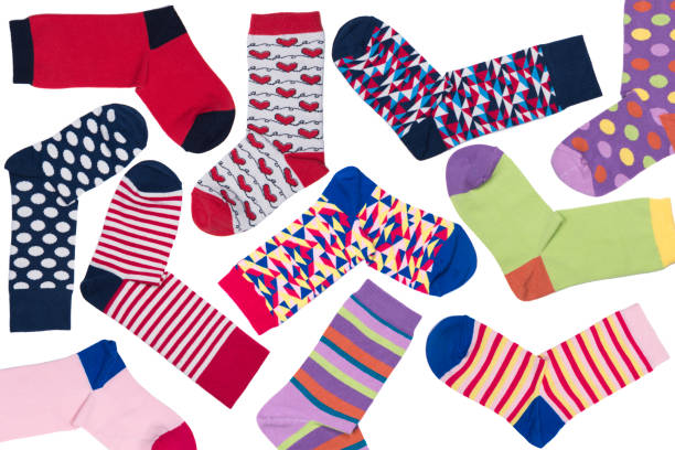 istock Cute Colorful Socks On White Background 1062259830