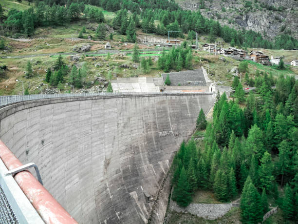 istock Beauregard Dam, a gravity arc construction, before the partial demolition which reduced the dam from 72 meters height to 20 meters height - Valgrisenche Village, Aosta Valley Province, Italy 1062260190