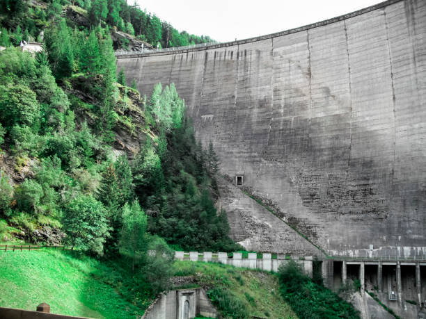 istock Beauregard Dam, a gravity arc construction, before the partial demolition which reduced the dam from 72 meters height to 20 meters height - Valgrisenche Village, Aosta Valley Province, Italy 1062261398