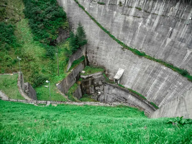 Beauregard Dam, a gravity arc construction, before the partial demolition which reduced the dam from 72 meters height to 20 meters height - Valgrisenche Village, Aosta Valley Province, Italy