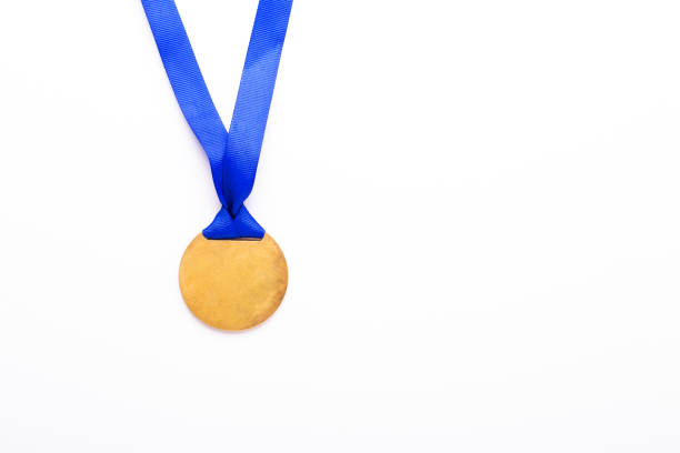 istock Gold medal with blue ribbon on white background. 1062265948