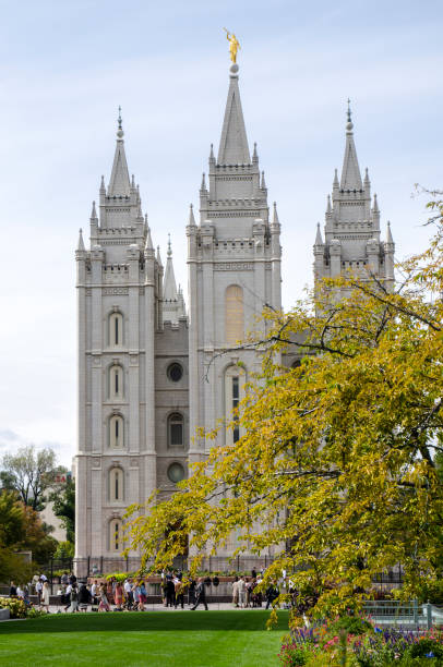 188th Semiannual General Conference of the Church in Salt Lake City, Utah. Salt Lake City, Utah, USA - October 6, 2018: Individuals and families from all over the world gather in Temple Square in the heart of Salt lake City, Utah for the 188th Semiannual General Conference of the Church of Latter Day Saint. The Conference is held biannually every April and October at the Conference Center in Salt Lake City, Utah. During each conference, members of the church gather in a series of two-hour sessions to listen to sermons from church leaders. Originating from Salt Lake City, General Conference is considered an international event for the church. The sessions are broadcast worldwide in over 90 languages and over the Internet. mormon woman photos stock pictures, royalty-free photos & images