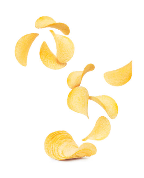 istock Potato chips rise up from the pile with chips, isolated on a white background 1062276434