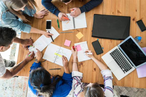 istock Young business team working together at office 1062278052