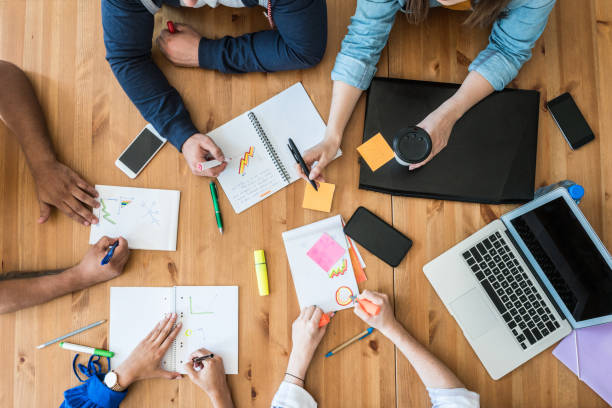 istock Young business team working together at office 1062278158