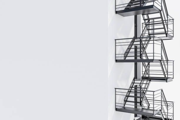 istock Mock up building wall, black fire escape stairs 1062278490