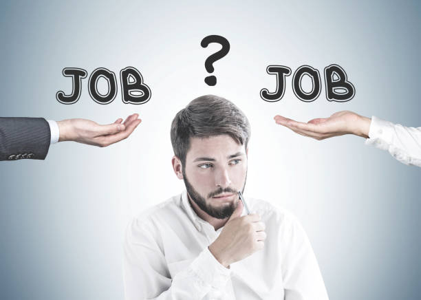 istock Thinking bearded young businessman, job choice 1062280308