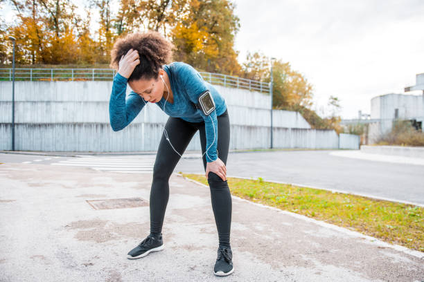 istock Young African woman taking a break after her workout 1062299298