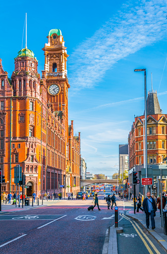 Manchester, UK, April 11, 2017: People are passing by the Principal hotel in Manchester, England