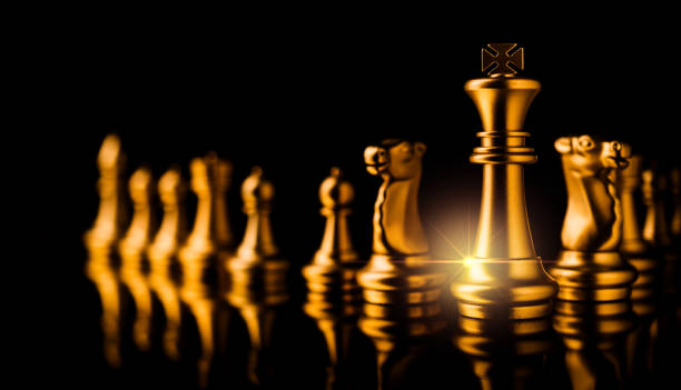 istock business strategy ideas concept golden chess competitive game dark color tone 1062314130