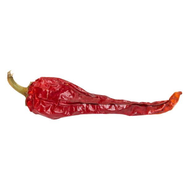 istock Dry chili pepper isolated on white. Dried vegetable 1062314288
