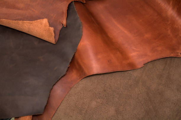 istock Texture of pieces brown leather. Natural material background 1062314388