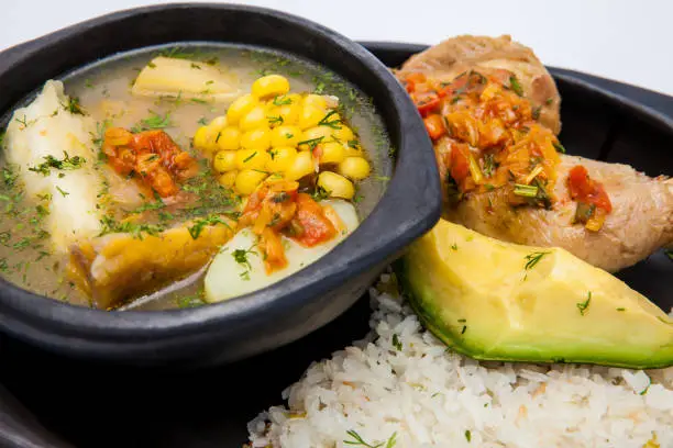 Traditional Colombian soup from the region of Valle del Cauca called sancocho isolated on white background