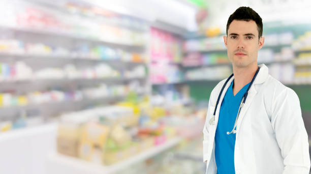 istock Male pharmacist working at the pharmacy. 1062332548