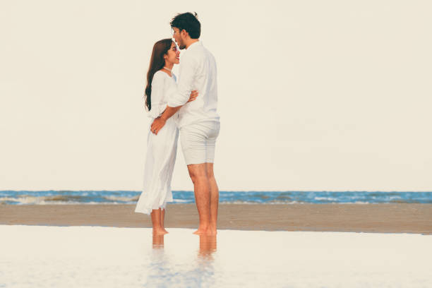 istock Couple going honeymoon on tropical beach in summer 1062334130