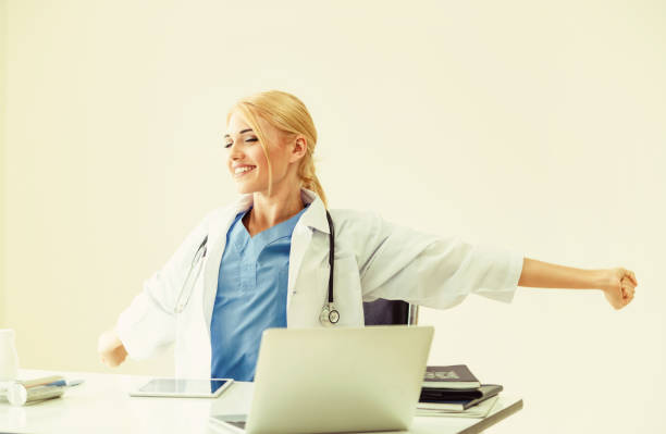 istock Relaxed doctor taking a break in hospital office. 1062336990