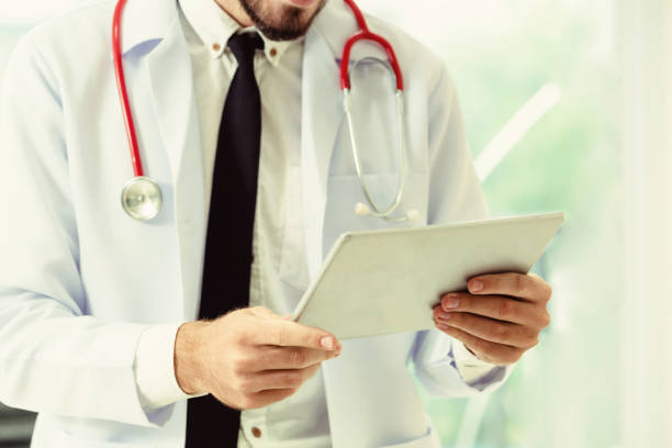 istock Doctor working on tablet computer in the hospital. 1062337100