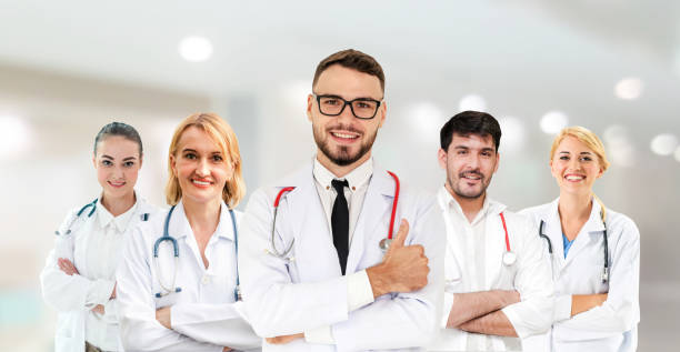 istock Doctor working in hospital with other doctors. 1062339600