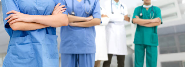 istock Doctor working in hospital with other doctors. 1062348652